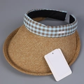 Detail of a straw sun visor with blue checkered trim and metal logo label on the headband - M (56-58cm) / Blue