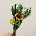 Dried flower bouquet with yellow and orange blooms and green leaves for home decor - Sunflower