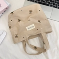 Beige corduroy draagtas met berenpatroon en geborduurde zwarte hartdetails - Khaki