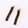 Long vertical gold earrings featuring rectangular black crystals and sparkling zircons - Black