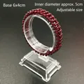 Detail view of red garnet beaded bracelet on an acrylic stand with 5cm diameter specs - No. 10 Vertical Detachable Bracelet Stand