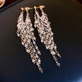 Close-up of gold layered heart tassel earrings on a textured dark leather background - 7# Silver Color with Silver Pin