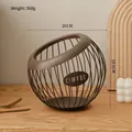 Dark brown metal wire coffee capsule storage basket with COFFEE sign on a wooden table - Flat Bottom: Noble Coffee Basket