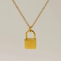 Golden padlock pendant necklace featuring an Old English style engraved letter B - Letter B Style