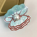 Pinza per capelli a conchiglia azzurra perlata con dettaglio di perla bianca - Blu