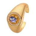 Vintage gold S925 silver ring with oval tanzanite gemstone and zircon halo on white background - Natural Tanzanite Style