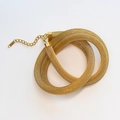 Close-up of golden mesh chain necklace showing woven texture and lobster clasp detail - Bracelet / 12mm / Gold