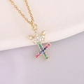 Detailed macro shot of 18K gold plated necklace with crown and letter X zircon pendant - Letter X Style