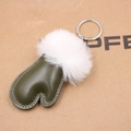 Detail of army green leather glove keychain with fluffy white faux fur ball and metal ring - Dark Green