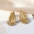 Elegant 18K gold plated wing earrings with sparkling rhinestones on white silk background - Gold