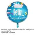 Close-up of 18 inch blue foil balloon with Feliz Cumpleaños text and sea illustrations - Spanish Birthday Ocean Round Balloon