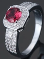 Elegant silver ring featuring a large round red zircon center with halo and paved band - Ur0584b