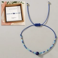 Details des September Saphir Perlenarmbands mit gewebter Kordel und Geschenkkarte - September Geschenkbox Plus/Blau/Saphir