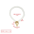 Detail of heart pearl bracelet showing 174mm length and 6mm bead size specs - Lava Heart Shape Charm