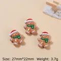 Three pieces of brown resin gingerbread man charms with red hats for DIY crafts - Gingerbread Man