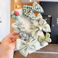 Handheld display of green fabric bow hair clips with polka dots and plaid patterns - 4# Green Bow Hair Clip 8-Piece Set (With Card)
