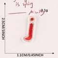Red embroidered lowercase letter J patch with white borders for clothing and school uniforms - Letter-J