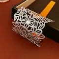Silver vintage open cuff bracelet with hollow floral engraving and luxury finish - Silver