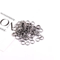 Pile of gun black metal jump rings for handmade jewelry making and DIY crafts - Gunmetal