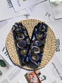 Navy blue suede gloves with spiral embroidery on a decorative woven mat background - One Size / Blue Brown Jacquard