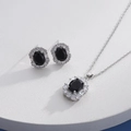 Detailed view of silver necklace and earrings set featuring oval black gemstones and zircons - Silver Oval Black (HQ0001(11))