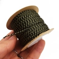 Detail showing 1mm black and gold braided cord on a spool for DIY jewelry making - Black