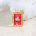 Macro detail of gold tarot eye pendant with pink enamel and crystals on white marble - Pink Eye Style (ZYN-DMK876G-1)