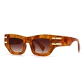 Lunettes de soleil œil de chat écaillé avec verres dégradés marron et détails dorés - Monture Écaille Lentille Thé