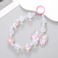 Close-up of a sweet pink bow pendant with iridescent beads and a heart-shaped charm - Faceted Heart Bowknot Style (K365) - Pink