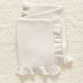 White ruffle knit baby blanket made of soft cotton displayed on a plush rug - 75*95cm / White