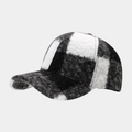 Close-up of thick sherpa baseball cap featuring a black and white checkerboard pattern - Color 1 / Black & White Checkerboard