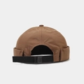 Detail of waterproof docker hat featuring adjustable nylon strap and plastic buckle closure - One Size(Adjustable) / Camel
