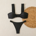 Black two-piece bikini set with twisted front top and high-cut bottom on rustic mat - S / Black