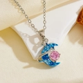Detailed close-up of blue moon pendant necklace with pink crystal on white stone - Silver Blue Moon Pink Zircon Necklace (T016)