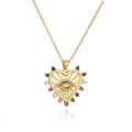 Gros plan du pendentif cœur en or 18K avec œil de démon en zircon et pierres colorées - Oeil Maléfique Coeur (22567) / Doré