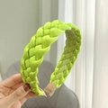 Detail showing the green braided satin headband with textured finish and secure beige ends - Fluorescent Green