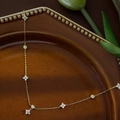 Elegante collana a quadrifoglio in argento placcato oro con ciondoli floreali in zircone - Collana Placcata Oro