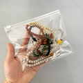 Multiple wooden beaded bracelets organized in transparent PVC plastic zipper storage bags - Slider Bag 18*15cm