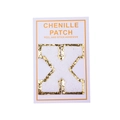 Detail of chenille letter X patch with gold glitter edge and peel-and-stick backing - Letter X / White