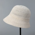 Close-up of the breathable hollow knit texture on a beige sun hat with crochet pattern - M (56-58cm) / Beige