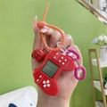 Red mini retro Tetris game console keychain with orange silicone strap and tiny bell - Solid Red
