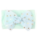 Detail of light green nylon headband with a large blue tulle bow and gold polka dots - Mint Green