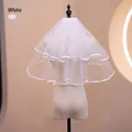 Detail of white two-layer short bridal veil with elegant satin ribbon edge on a mannequin - 50cm / White (Kids)