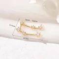 Detailansicht Zwillinge Sternbild Anhänger aus 14k Gold mit Zirkonia, 20.4mm x 13.94mm - Zwillinge