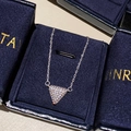 Silver triangle pendant necklace with zircon pavé inlay in a navy jewelry box - Necklace (Silver)