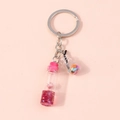 Pink wishing bottle keychain with dried flowers and sequins for handbags and car keys - Pink Flower Candy (YZ133)