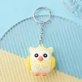 Cute yellow silicone owl keychain with cartoon owl pendant and silver metal ring - Yellow