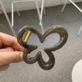 Translucent dark grey butterfly hair claw clip with golden spring mechanism - Dark Gray