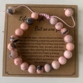 Pink zebra stone bead bracelet with 8mm round stones on motivational card packaging - Pink Gray Braided Adjustable Style