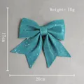 Deep peacock green sparkling Christmas bow ornament with glitter, 20cm width and 17cm height - Cyan
